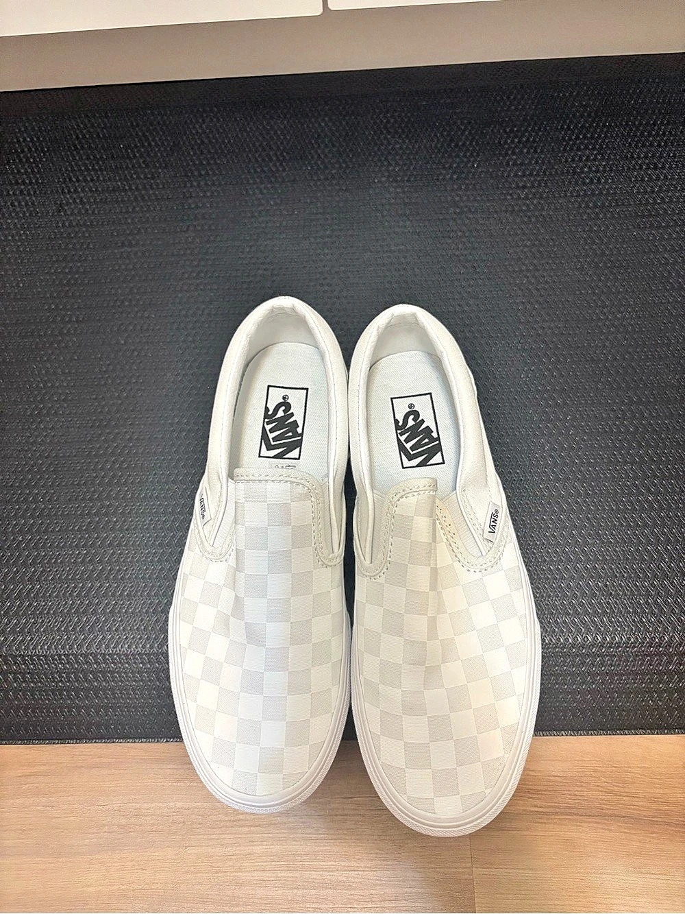 Vans Classic Slip-On Checkerboard Sneakers in White Unisex. women’s 9. Men’s 7.5